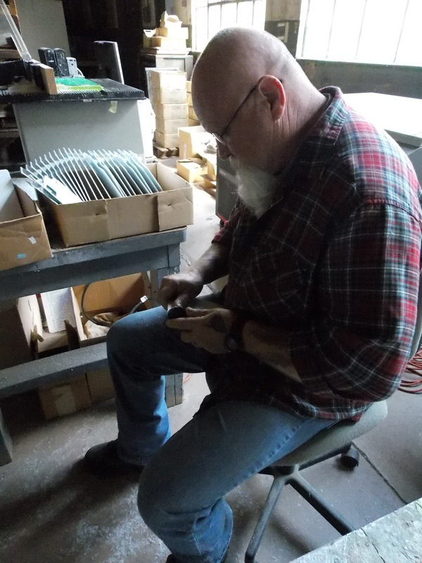 finishing a thermometer mount by hand