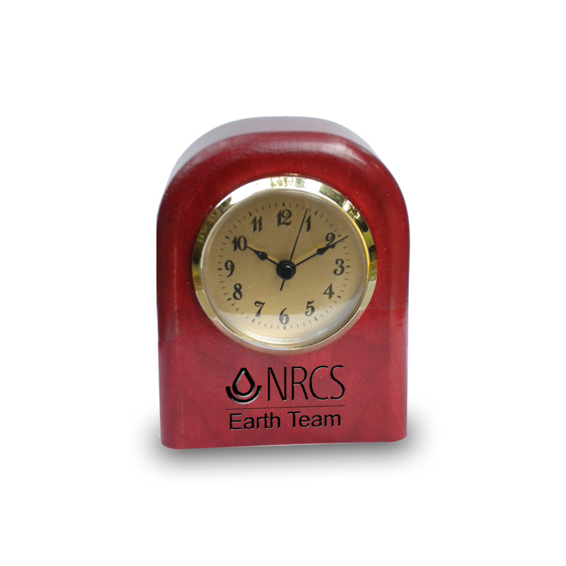 Wooden clocks with legacy nrcs logo and earth team text