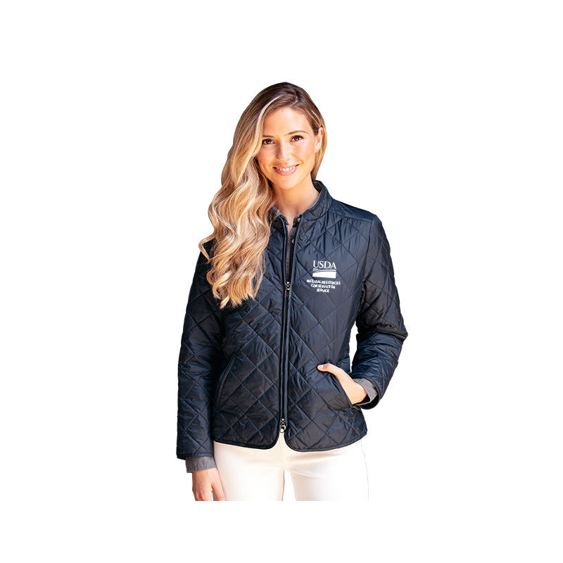 Quilted women's jacket with USDA logo and NRCS text